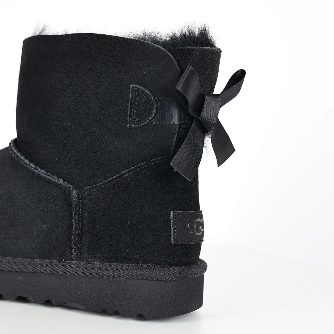UGG Bailey Bow Mini Ankle Boot – Women's Shearling-Lined Winter Boot with Bow Detail in Black