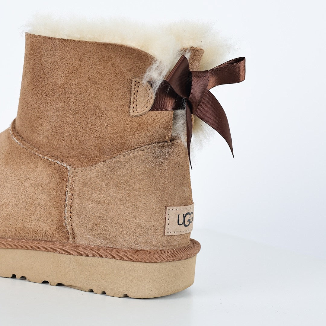 UGG Bailey Bow Snow Boots – Warm-Lined Women's Winter Boot with Bow Detail in Chestnut